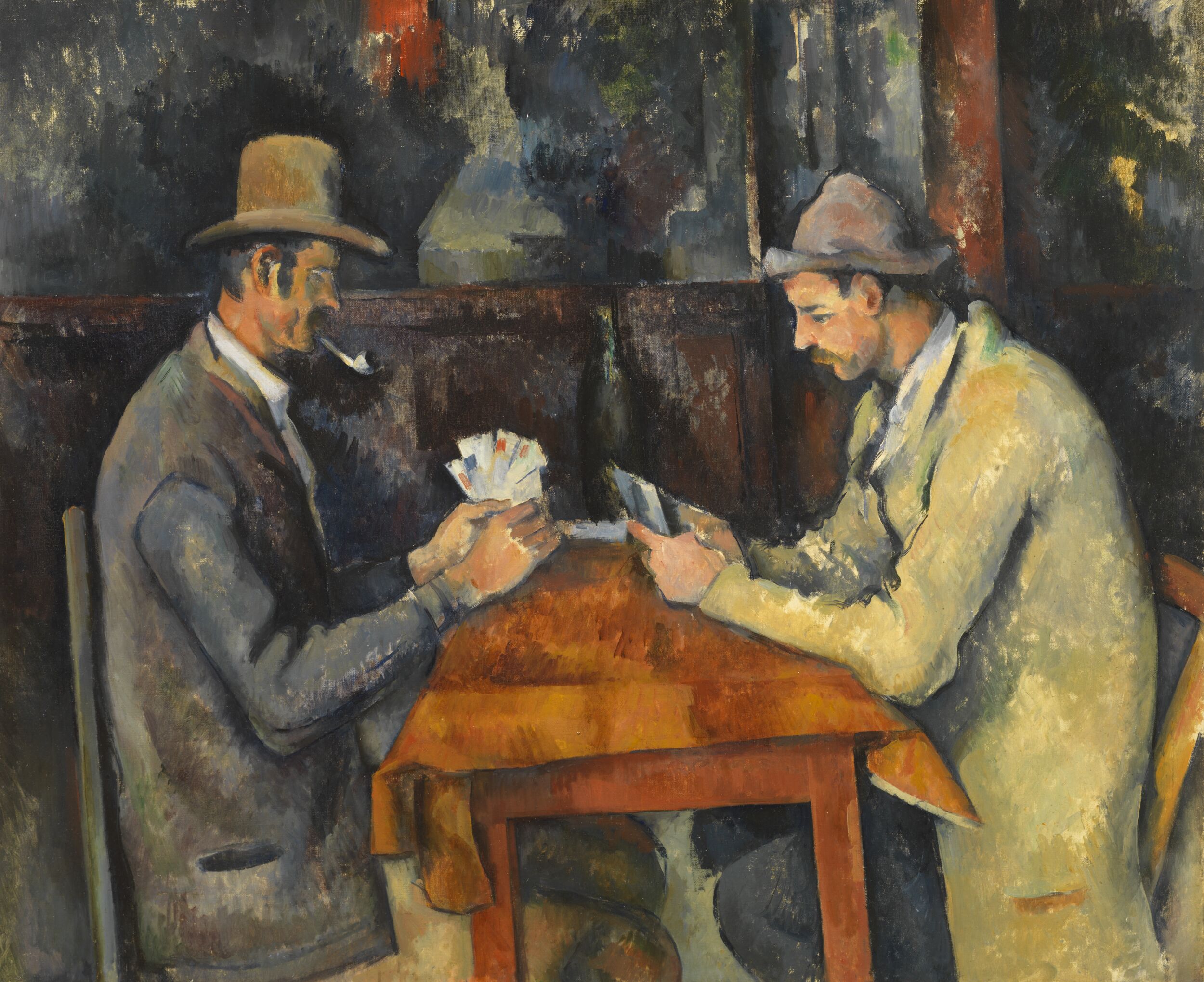 I giocatori di carte di Paul Cézanne, due uomini seduti a un tavolo intenti a giocare a carte